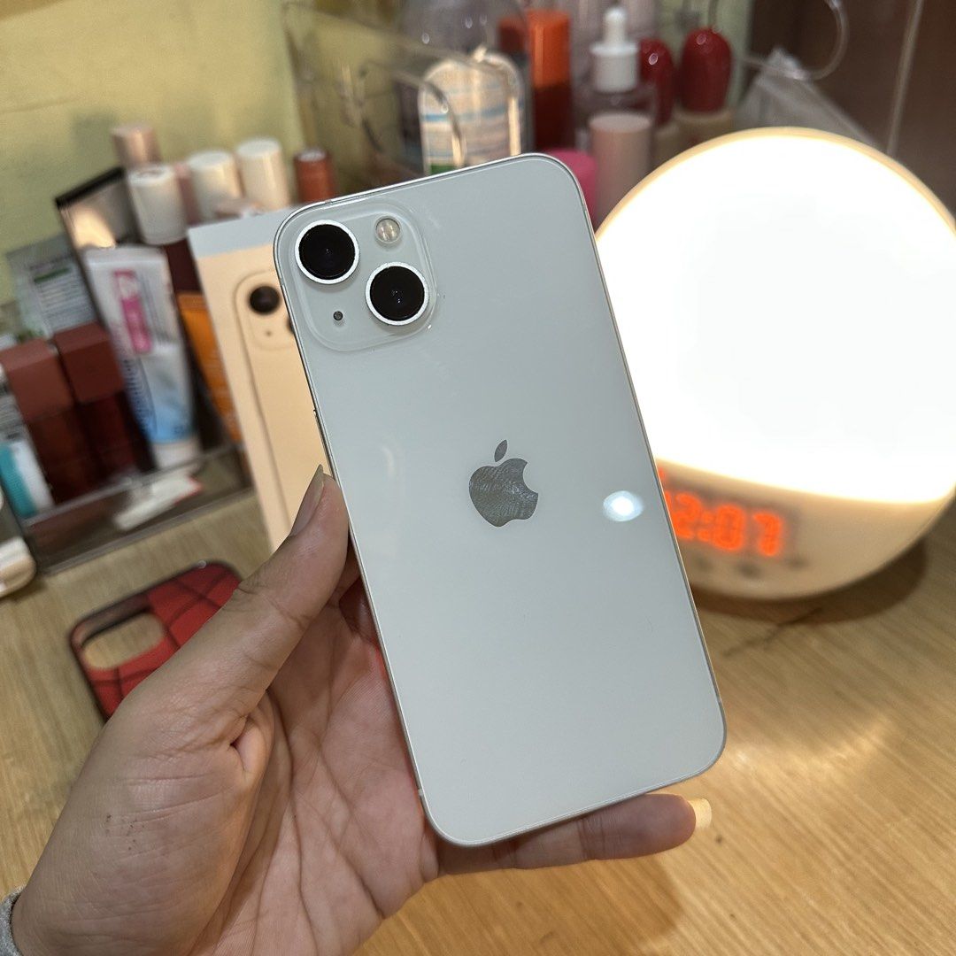 FOR SALE: IPHONE 13 (STARLIGHT) (Category: iPhone 13 Series) located in Valenzuela. Submitted by leyaisha (Listing ID 1459789600, Image 2). Description: FOR SALE: IPHONE 13 (STARLIGHT) - 128gb - ZP/A VARIANT, NTC APPROVED‼️ - No issue orig all parts (no history of repair) - 79% bh (orig, makunat pa!) - FU (anysim) - Truetone and Face ID working - Unli check and unli reset - With Orig box (same IMEI), case, orig cord MEET UP ONLY!! PM AGAD.