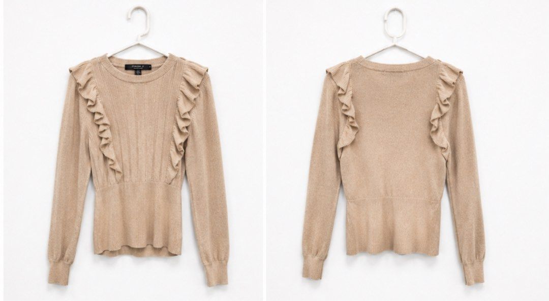 Forever 21 Ruffled Knit Sweater (Category: Coats, Jackets and Outerwear) located in Antipolo. Submitted by prelovedbyklzur (Listing ID 1459806608, Image 1). Description: - Light pink knit sweater - Ruffled details on front and shoulders - Long sleeves with ribbed cuffs - Ribbed hemline.