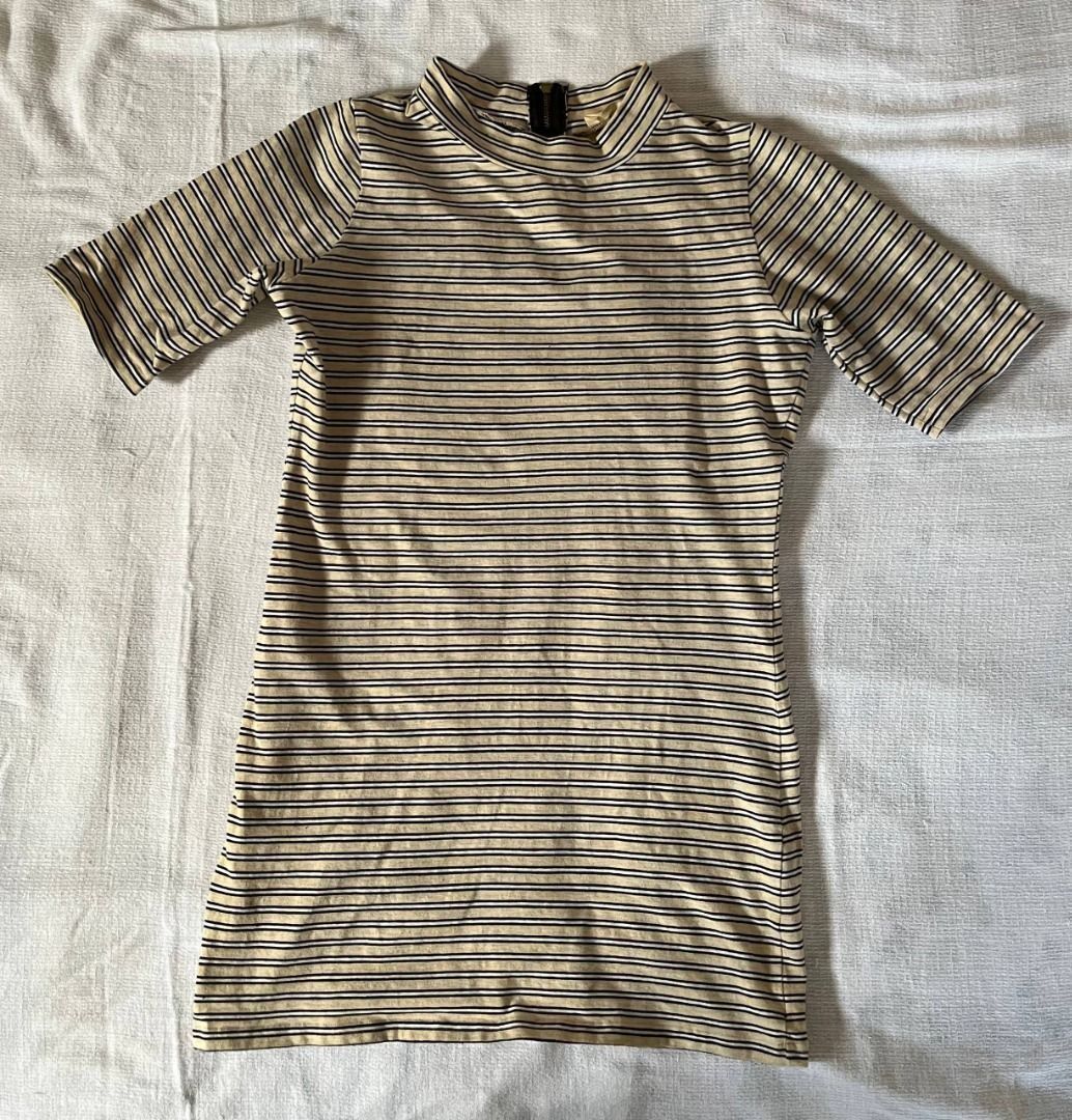 Forever 21 Striped Mock Neck Short Sleeve Top (Category: Blouses) located in Caloocan City. Submitted by fishfilei (Listing ID 1459789727, Image 1). Description: Details: • Mock neck with back zipper closure • Short sleeves • Size on tag: L (Kids size / Fits XXS–XS adults) • Note: This item is fitted and is likely a Kids Size Large, not a standard adult Large. For reference, I have a 23-inch waist and 32-inch bust. Message me for when worn photos
