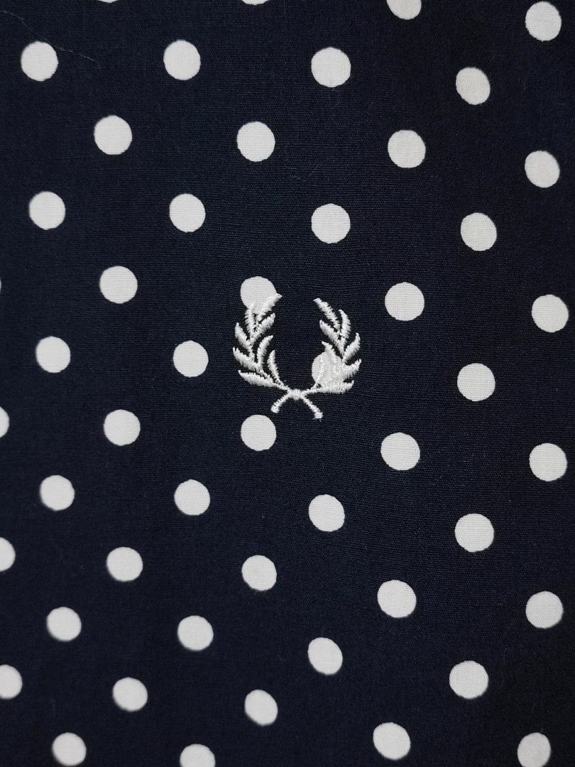 FRED PERRY POLKA DOT BUTTON-DOWN LONG SLEEVES (Category: Formal Shirts) located in Iloilo. Submitted by gooddimes (Listing ID 1459817162, Image 3). Description: Fred Perry Polka Dot Button-Down Long Sleeves Authentic Dark Blue color Size on tag: Small Dimes: 19Wx27L Issue/s: None, need wash Color rate: 10/10 Like new condition ₱1,500 Reminders: - All items are thrifted, please manage your expectations - Color may vary due to lighting - Please was