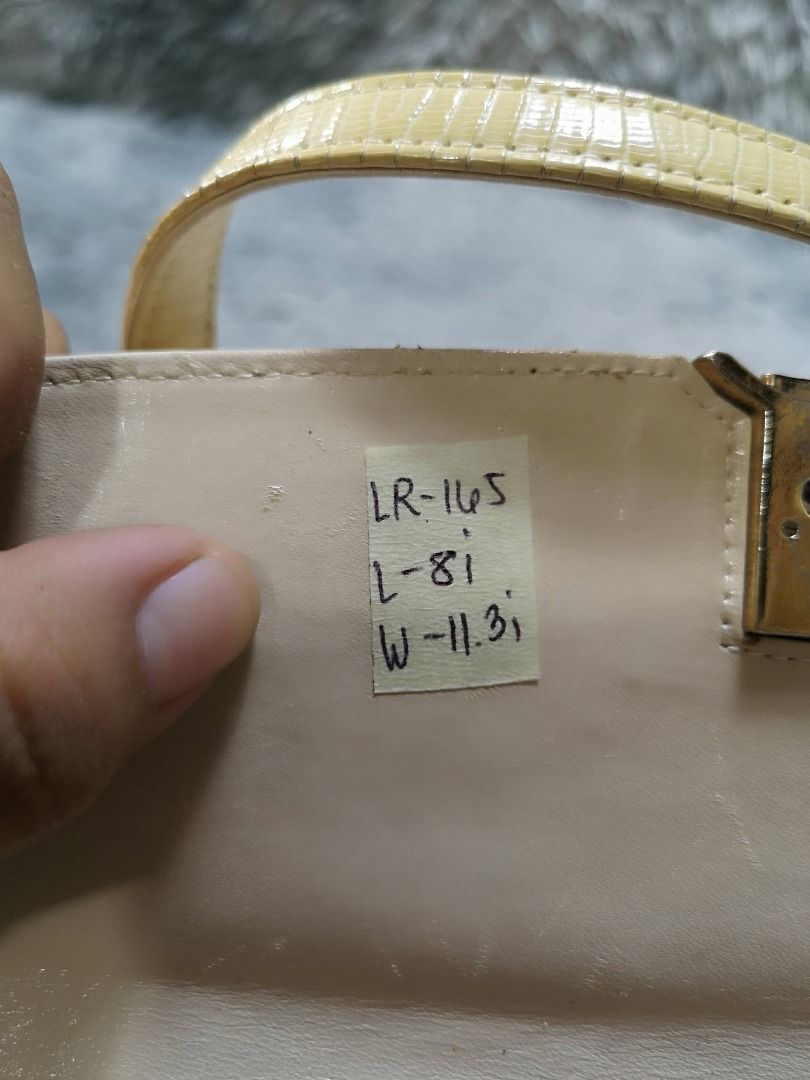 Front Flap Vintage Leather Dual Strap Hand Bag (Category: Purses & Pouches) located in Santa Cruz. Submitted by jmy_surplus.2 (Listing ID 1459721501, Image 3). Description: Size ; L - 8 W - 11.3 Color ; Light Yellow Type ; Hand bag Brand ; No brand Material ; Leather Style ; Snap Closure Leather Hand Bag LR 165 JMY 4 Batch #220 AVAILABLE.