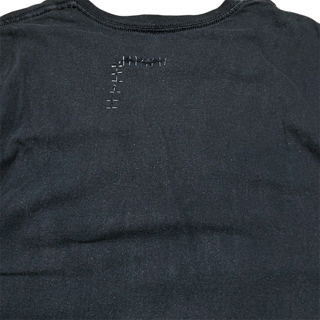 GERMS (GI) Double Layered Long Sleeve T-Shirt (Category: Tshirts & Polo Shirts ) located in Naga. Submitted by lootersfinder (Listing ID 1459780365, Image 2). Description: - Black long sleeve tee with integrated white thermal layer. - Features the distinctive GERMS (GI) graphic on the front. - Raw hem on the outer tee for a modern look. - Subtle stitching detail on the back near the collar. - Offers a unique and stylish layered aesthetic..