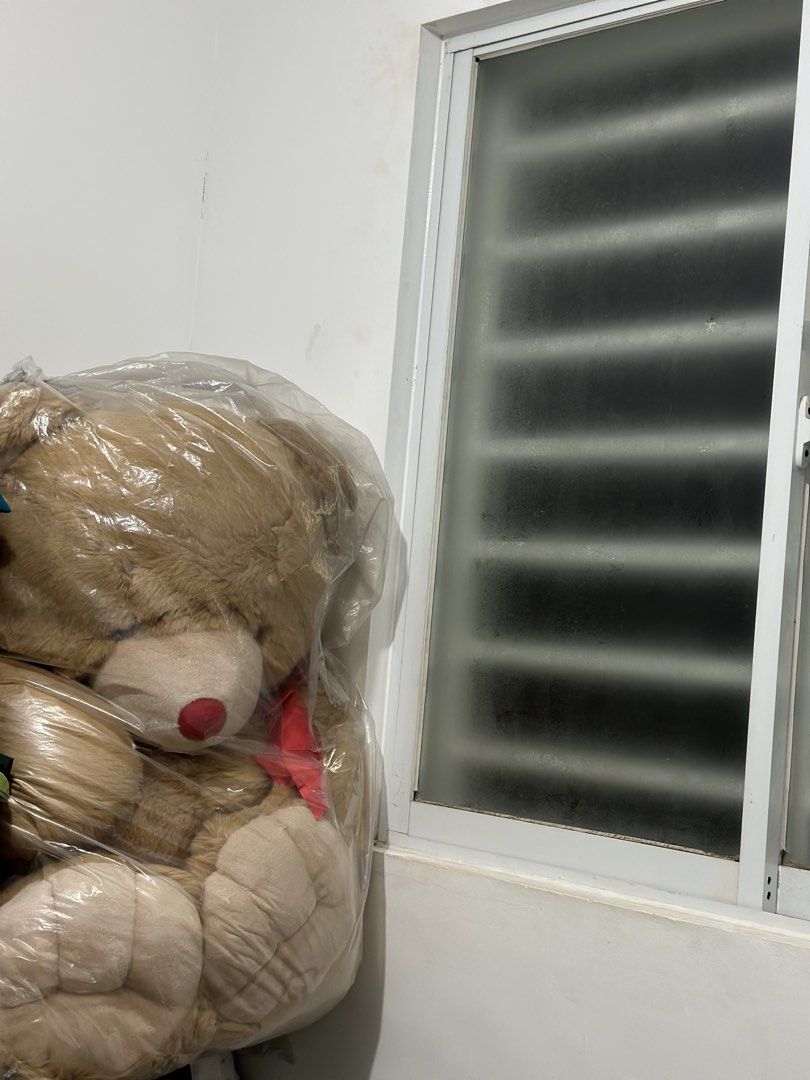 Giant Brown Teddy Bear Plush Toy (Category: Plushies & Soft Toys) located in Batangas. Submitted by enyahsnivl56498 (Listing ID 1459806930, Image 2). Description: - Super big teddy bear - Perfect for hugs or room decoration - Adorable red nose and red ribbon - Soft and fluffy fur - Still in original plastic packaging - Ideal gift for someone special.
