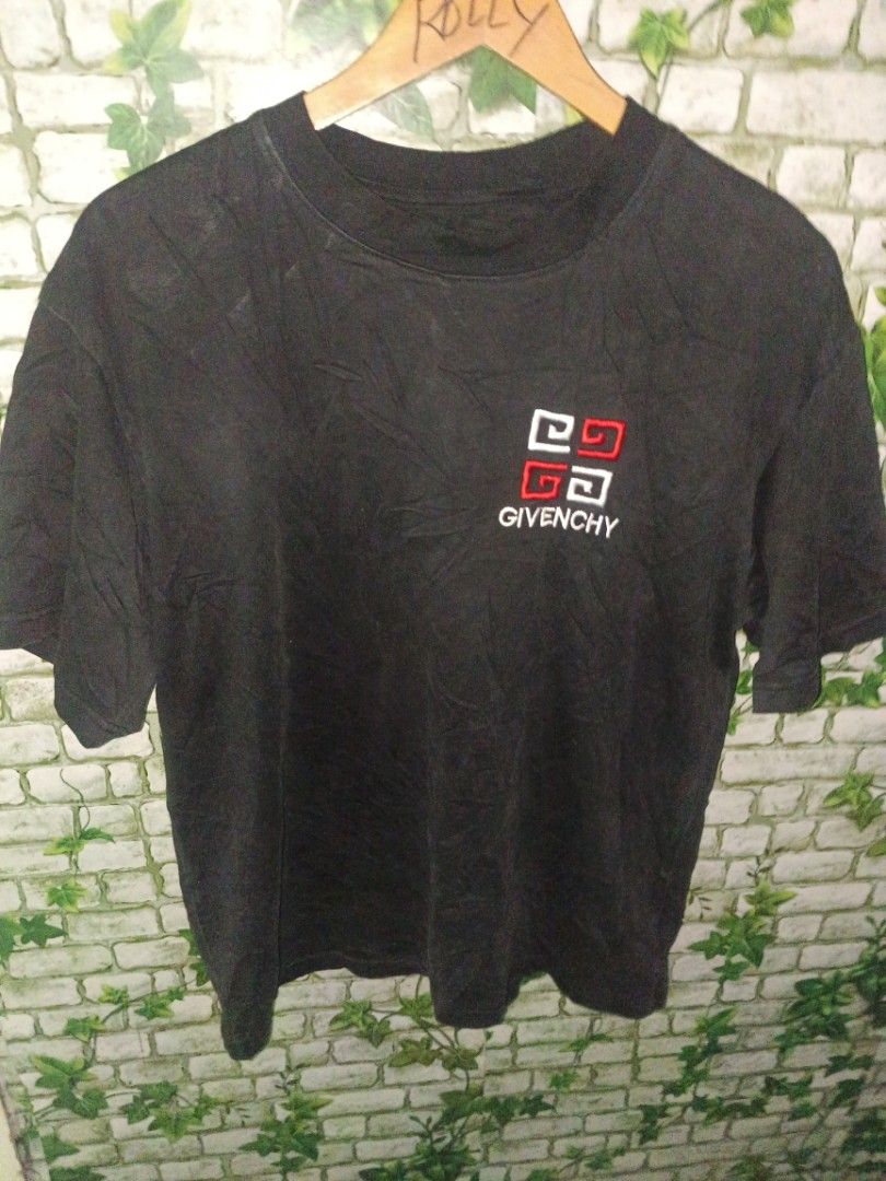 Givenchy Black T-shirt with Logo (Category: Tshirts & Polo Shirts ) located in Carcar. Submitted by rolandobac92675 (Listing ID 1459746077, Image 2). Description: - Authentic Black Givenchy T-shirt - Features iconic embroidered Givenchy logo on chest - Made from soft, comfortable fabric - Relaxed fit, perfect for casual outings.