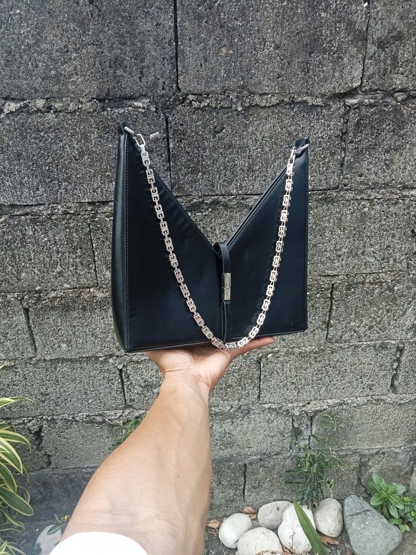 Givenchy cut out leather shoulder bag (Category: Luxury Bags & Wallets) located in Bagabag. Submitted by thrift_stories96 (Listing ID 1459855127, Image 2). Description: Givenchy cut out leather shoulder bag Medium size Measurements Height - 11 Width - 10.5 Condition - Rank AB Flaw - pressmark Normal sign of use ,needs cleaning only..