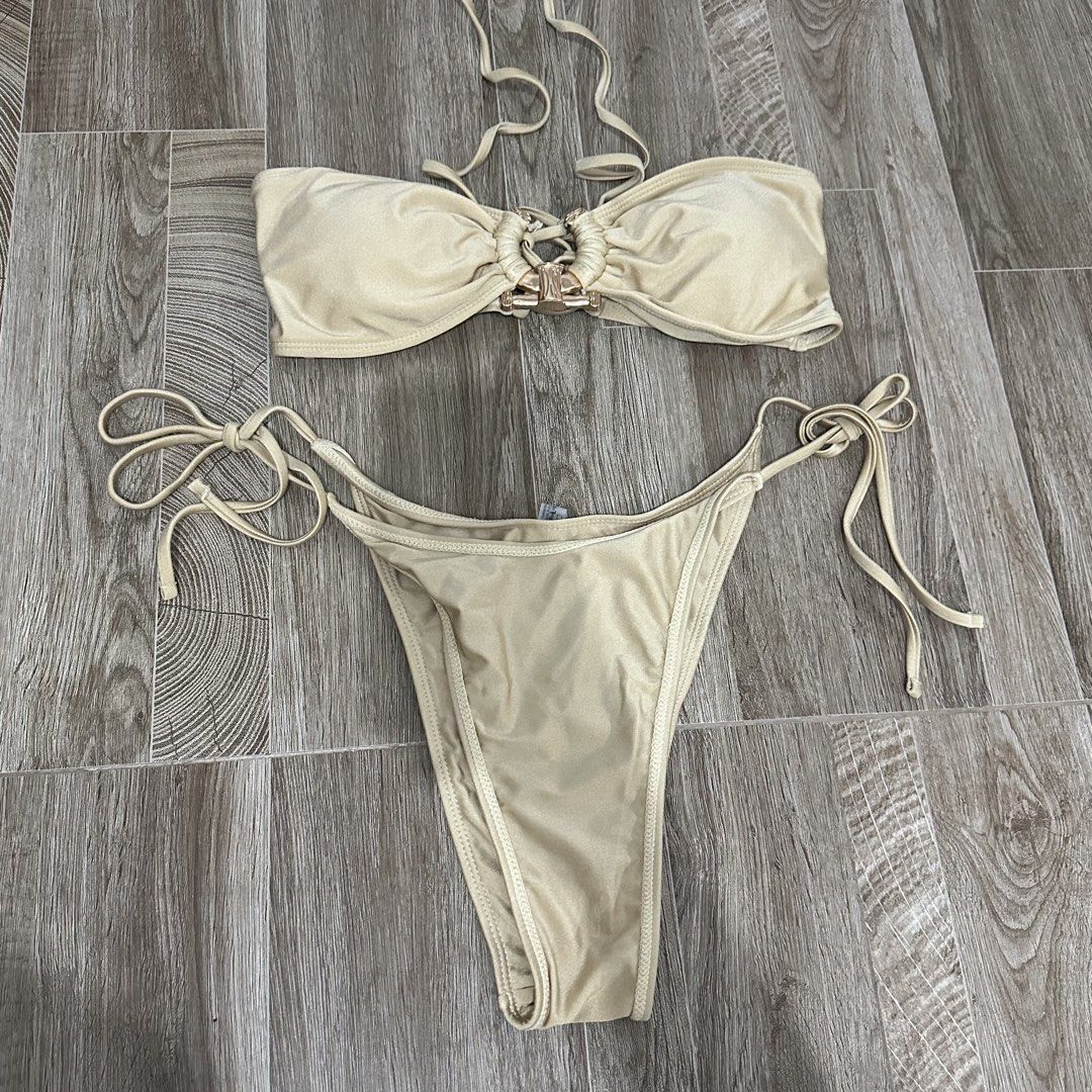 GOLD BANDEAU BIKINI SET (Category: Bikinis & Swimsuits) located in Makati City. Submitted by champ4gnemami (Listing ID 1459752160, Image 1). Description: too big for me.