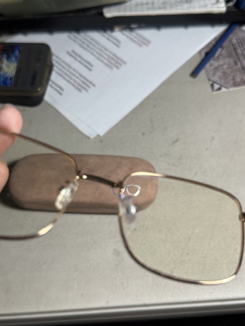 Gold Frame Blue Light Blocking Glasses with Case (Category: Sunglasses & Eyewear) located in Manila. Submitted by fridayvarias_ (Listing ID 1459721245, Image 3). Description: - Square-shaped glasses with a chic gold frame. - Lightweight and comfortable for all-day wear. - Features blue light blocking lenses, ideal for reducing eye strain during screen time. - Comes with a stylish light brown protective case. - Versatile for everyday use or as a f
