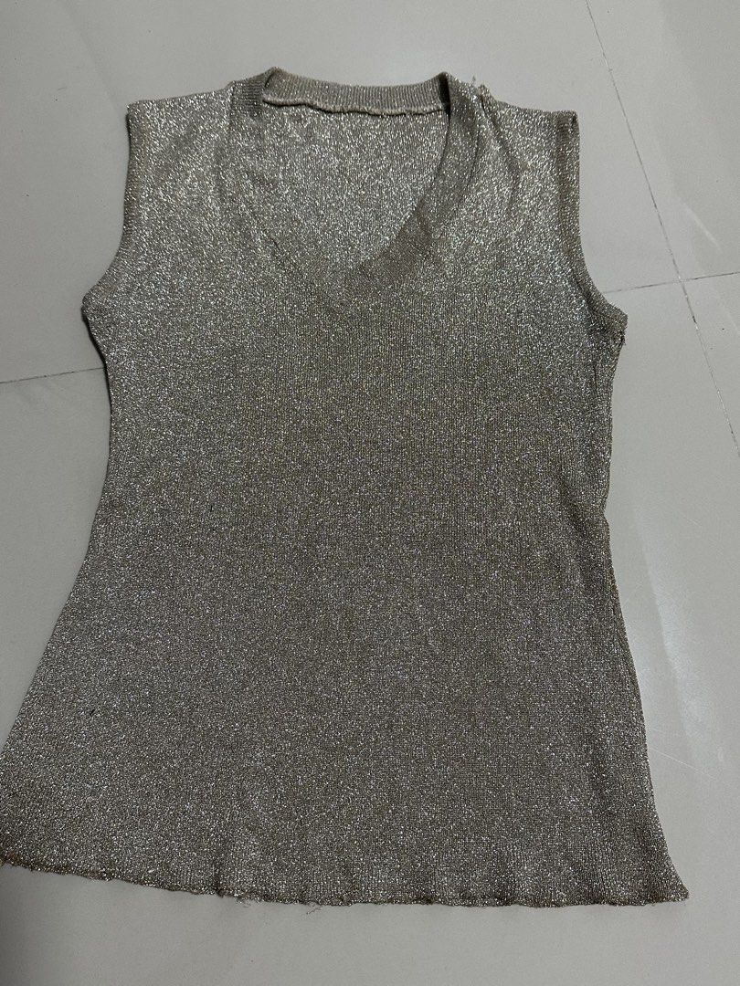 Gold Sleeveless Vneck Top (Category: Others Tops) located in Manila. Submitted by mae__________c (Listing ID 1459787576, Image 1). Description: Stretchable no issue decluttering Small to medium sta ana manila.