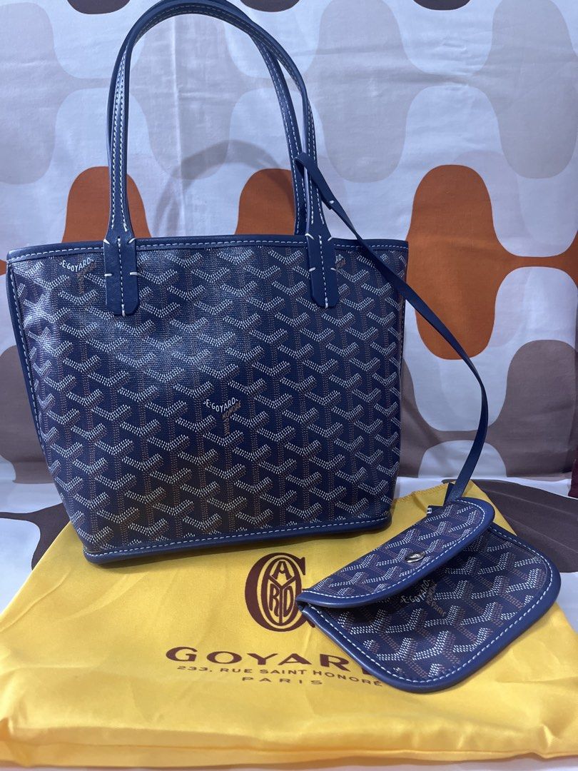 Goyard Blue Monogram Tote Bag with Pouch (Category: Luxury Bags & Wallets) located in Las Pinas. Submitted by erenrosc (Listing ID 1459714748, Image 1). Description: - Classic Goyard tote bag in navy blue - Features the iconic Goyard monogram pattern - Comes with a matching small pouch - Durable leather handles and trim - Stylish white contrast stitching - Spacious interior, ideal for everyday use.