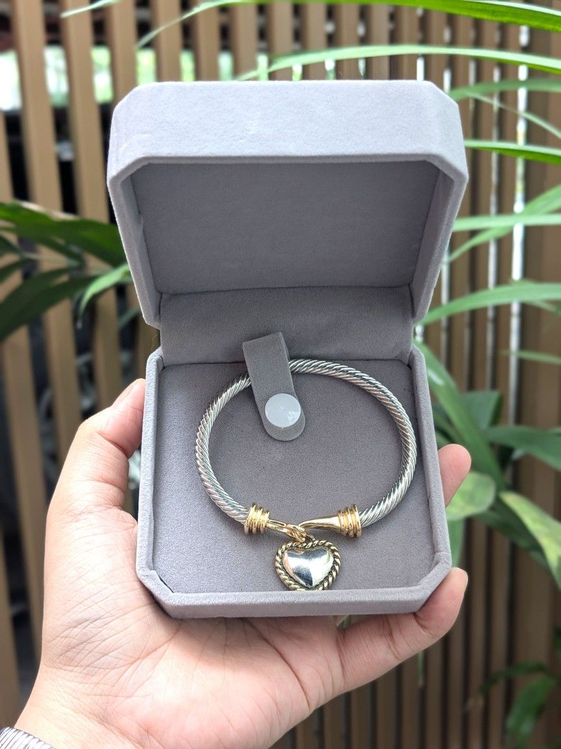 Gradiant Silvertone Gray Two Tone Heart Bangle Bracelet (Category: Bracelets) located in Quezon City. Submitted by nnncorner (Listing ID 1459871460, Image 2). Description: BKK Gradiant Silvertone Gray Two Ton Heart Bangle Stainless Steel New with box Hypoallergenic Non tarnished Fits 15-21cm wrist only 780.