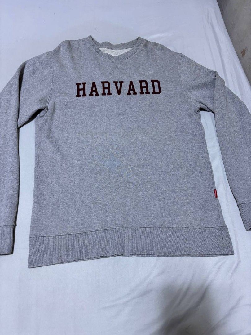 Grey Harvard University Crewneck Sweatshirt (Category: Coats, Jackets and Outerwear) located in Pasig City. Submitted by heneralsupremo1892 (Listing ID 1459694638, Image 1). Description: - Grey sweatshirt with 'HARVARD' in maroon print - Classic crewneck design - Ribbed cuffs and hem for a snug fit - Comfortable and casual, ideal for everyday wear - Features a small red tag on the side - Authentic and Legit❗ - Very Good Condition/ Almost New 🔥 -