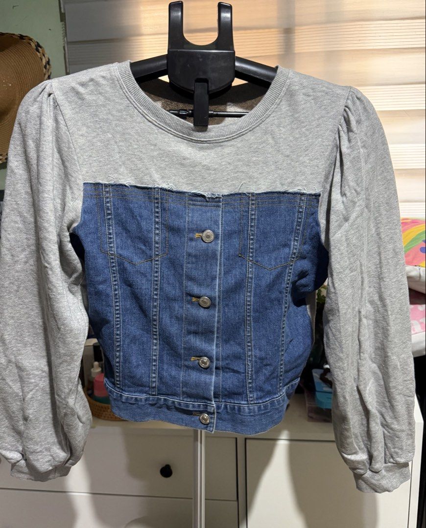 Grey Sweatshirt Denim Combo Jacket with Puff Sleeves (Category: Coats, Jackets and Outerwear) located in Manila. Submitted by maddie29 (Listing ID 1459702158, Image 1). Description: - Grey sweatshirt material top - Blue denim button-up front - Puff sleeves for a stylish touch - Fun, casual piece - Perfect for layering - Full button closure down the front.