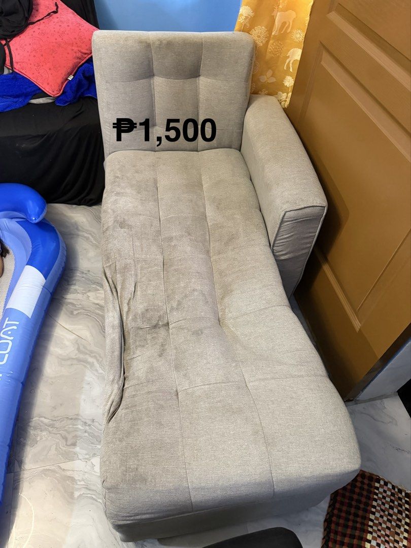Grey Tufted Chaise Lounge Sofa (Category: Sofas) located in Manila. Submitted by ritzchelle44286 (Listing ID 1459740829, Image 1). Description: - Stylish grey chaise lounge - Features elegant tufted backrest and seat - Perfect for relaxing or as additional seating - Price is negotiable - Message for more details or to schedule a viewing.