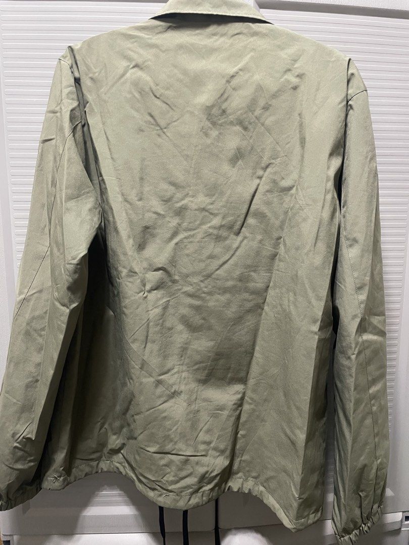 GU Coach Jacket Olive Green (Category: Coats, Jackets and Outerwear) located in Itogon. Submitted by boyetfinds (Listing ID 1459830221, Image 2). Description: - Olive green GU coach jacket - Button-up front - Two side pockets - Elasticated cuffs and hem - Lightweight material, perfect for layering - Versatile for casual outfits -Wore once.