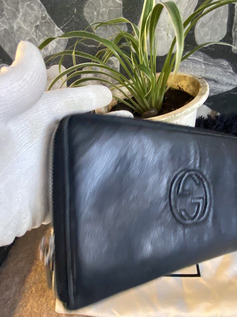Gucci Black Leather Zip Around Wallet (Category: Luxury Bags & Wallets) located in Bacolod City. Submitted by chuchaystuffs (Listing ID 1459741312, Image 3). Description: - Authentic Gucci black leather zip-around wallet - Features iconic embossed GG logo on the front - Ample space inside for cards and cash - Comes with original Gucci dust bag - A classic and versatile accessory for everyday.