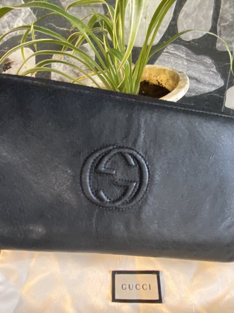 Gucci Black Leather Zip Around Wallet (Category: Luxury Bags & Wallets) located in Bacolod City. Submitted by chuchaystuffs (Listing ID 1459741312, Image 2). Description: - Authentic Gucci black leather zip-around wallet - Features iconic embossed GG logo on the front - Ample space inside for cards and cash - Comes with original Gucci dust bag - A classic and versatile accessory for everyday.