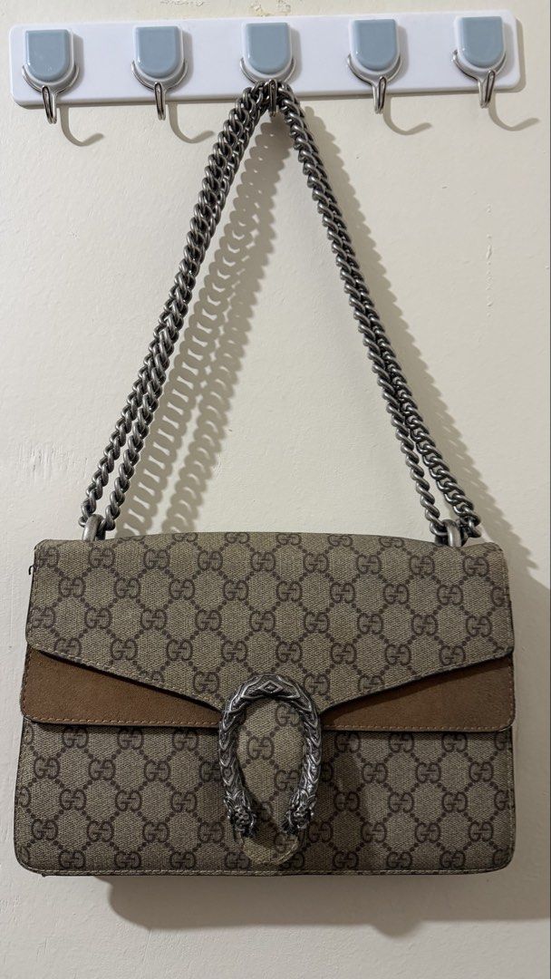 Gucci Dionysus Double Flap Convertible Bag (Category: Cross-body Bags) located in Rizal. Submitted by lovegclothingph (Listing ID 1459824201, Image 1). Description: - Gucci Dionysus Bag - Convertible (Shoulder or sling bag) - Iconic GG Supreme Canvas with Suede Trim - Signature Silver-tone Dionysus Tiger Head Closure - Versatile Chain Strap for Shoulder Wear - Interior Zip Pocket for Organization - Ideal for Day or Evening Use - With signs of usa