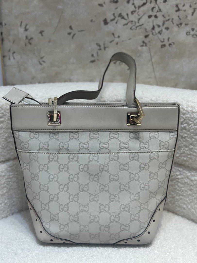 Gucci Mini Guccissima Punch Tote Bag Authentic (Category: Luxury Bags & Wallets) located in Manila. Submitted by allthingsilove65 (Listing ID 1459786296, Image 2). Description: Authentic Gucci Mini Guccissima Punch Tote Bag In Guccissima white leather With Entrupy Certificate Goes well with any outfit Like New Retails for 40k pre loved (see last picture) .