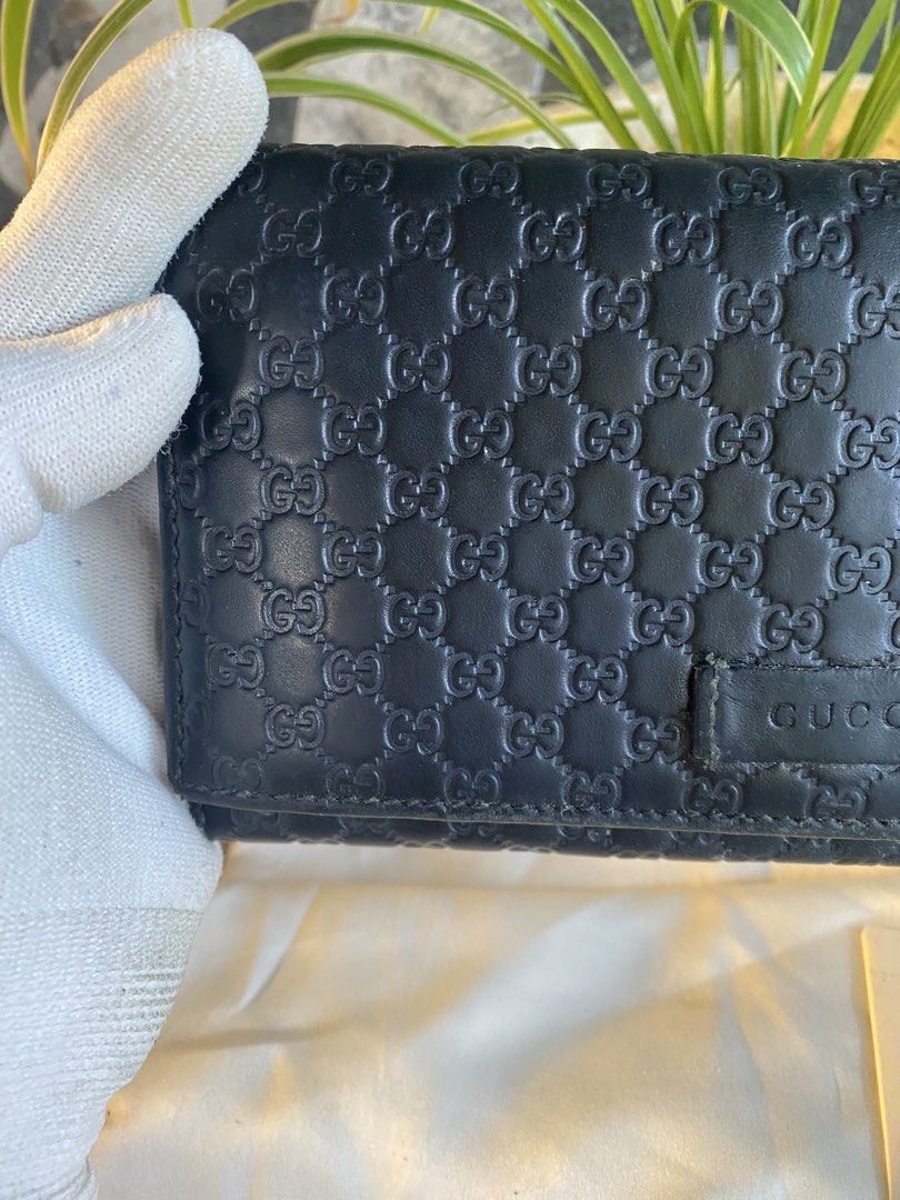 Gucci Monogram Leather Long Wallet (Category: Luxury Bags & Wallets) located in Bacolod City. Submitted by chuchaystuffs (Listing ID 1459741143, Image 3). Description: - Authentic Gucci long wallet - Iconic GG monogram embossed on black leather - Ample space for cards and cash - Includes dust bag and authenticity card - Perfect for everyday use .
