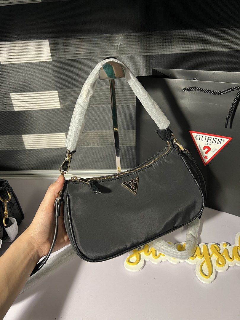 GUESS NYLON BAGUETTE (Category: Shoulder Bags) located in Malolos. Submitted by sunnysideup2018 (Listing ID 1459883475, Image 2). Description: All MPO items are last price already!♥️ Mura na po lahat yan🥰 JNT/SCO couriers🚛 Actual photos posted na din po (own photos) Message me to order💋.