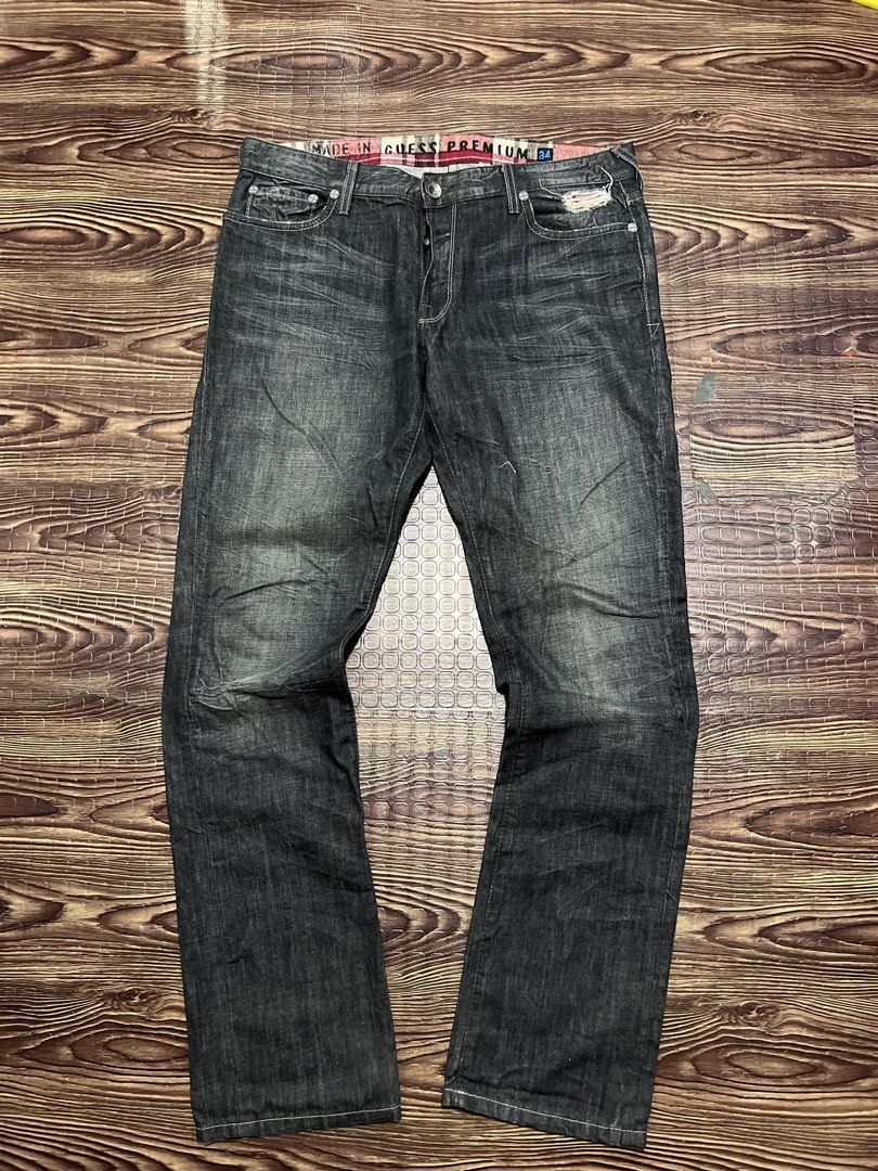 Guess Premium Jeans - Dark Wash - Size 34 (Category: Jeans) located in Manila. Submitted by okeanos (Listing ID 1459756785, Image 1). Description: - Guess Premium dark wash jeans - Straight leg fit - Button fly closure - Distressed and ripped details on front pockets and thigh - Tagged size 34 - Measurements available in photos - Please check pictures for detailed condition.