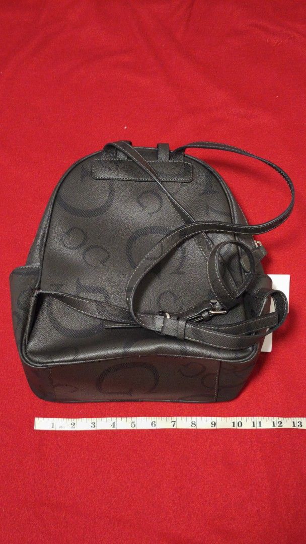 Guess Ryerson Backpack Coal CC731130 (Category: Backpacks) located in Angono. Submitted by declutterstar09 (Listing ID 1459807752, Image 3). Description: - Guess backpack in Coal color - All-over GG pattern - Front zip pocket - Adjustable straps - Perfect size for everyday essentials - Measurements: Height approx 10 inches, Width approx 8 inches, Depth approx 4 inches - Comes with original tags.