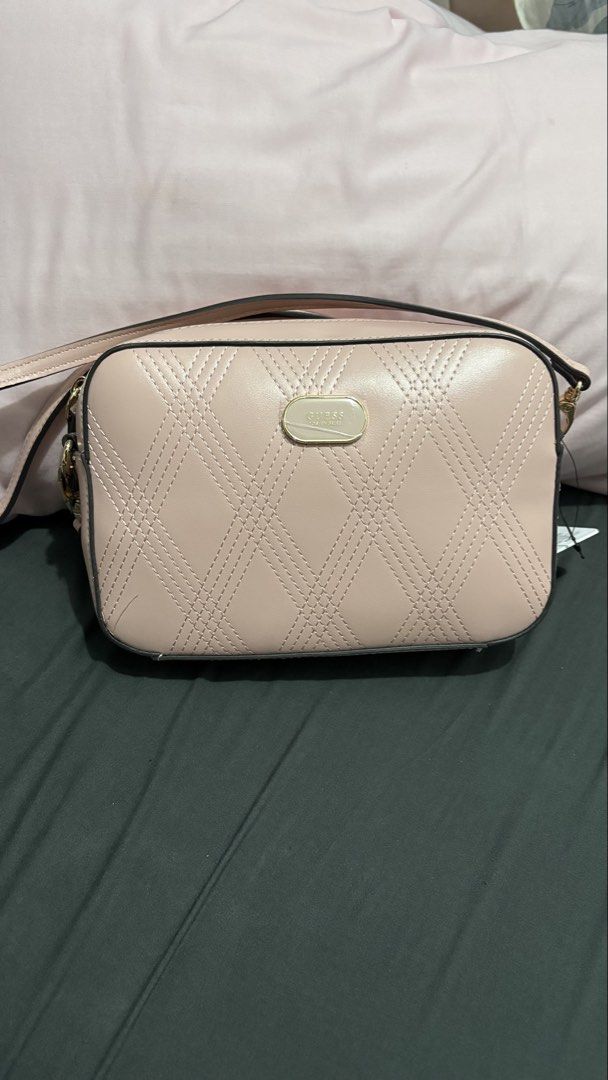 Guess Sling Bag in Pink (Category: Cross-body Bags) located in Manila. Submitted by hannahbiiiii (Listing ID 1459829771, Image 1). Description: -100 % original -seller gave wrong item couldn't exchange mode of payment: gcash or bank transfer mode of delivery: lalamove/grab/j&t can do meet-up.