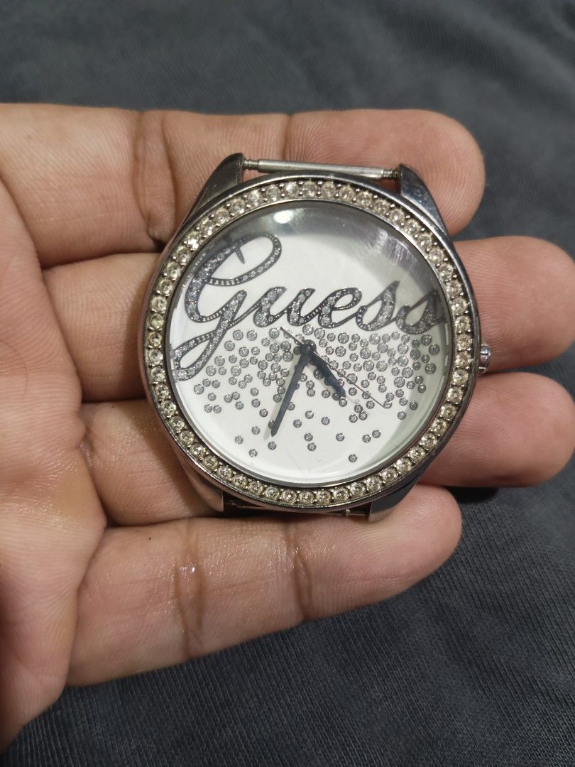 Guess Watches 3pcs (Category: Men's Watches) located in Quezon City. Submitted by kenz1000 (Listing ID 1459781168, Image 3). Description: For Sale -3pcs Authentic Guess watches -Stainless steel lahat ng case -All in good working condition -44mm, 41mm, 36mm case -issue-- need straps, kulang mga bato (check pics) -1500php take all only -Litex Commonwealth meetup/pickup, rider pickup si buyer magbook, regular LBC shipping.