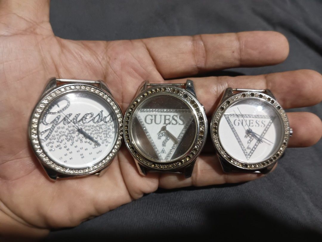 Guess Watches 3pcs (Category: Men's Watches) located in Quezon City. Submitted by kenz1000 (Listing ID 1459781168, Image 1). Description: For Sale -3pcs Authentic Guess watches -Stainless steel lahat ng case -All in good working condition -44mm, 41mm, 36mm case -issue-- need straps, kulang mga bato (check pics) -1500php take all only -Litex Commonwealth meetup/pickup, rider pickup si buyer magbook, regular LBC shipping.