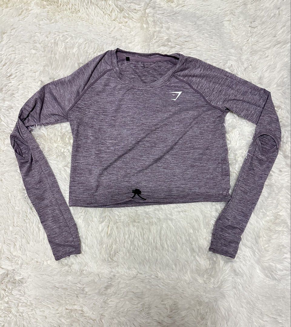 Gymshark crop top long sleeves (Category: Activewear) located in Antipolo. Submitted by swertecat (Listing ID 1459781711, Image 3). Description: Cut tag but authentic May hairline crack print sa logo.