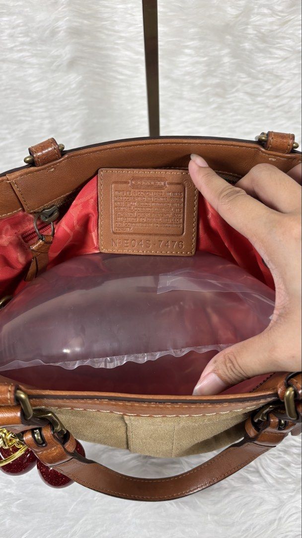 Hamptons Suede Tassel Satchel (Category: Shoulder Bags) located in Manila. Submitted by vintage_og_bagash (Listing ID 1459831900, Image 3). Description: Vintage Coach Hamptons Suede Tassel Satchel 🤎 Soft suede, brown leather details & that classic vintage charm. .