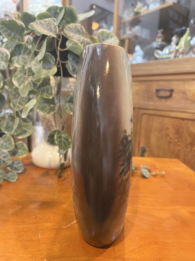 Hand Painted Mariupol Water Tower Pillow Shape Ceramic Vase (Category: Vases & Decorative Bowls) located in Calamba. Submitted by chebvintagedepot (Listing ID 1459762787, Image 3). Description: [B06-01] This ceramic vase has a distinctive flattened oval form with hand-painted architectural scenes. One side depicts the historic Old Water Tower in Mariupol, Ukraine, with the city name “Мариуполь” written above in Cyrillic script. The other side sho