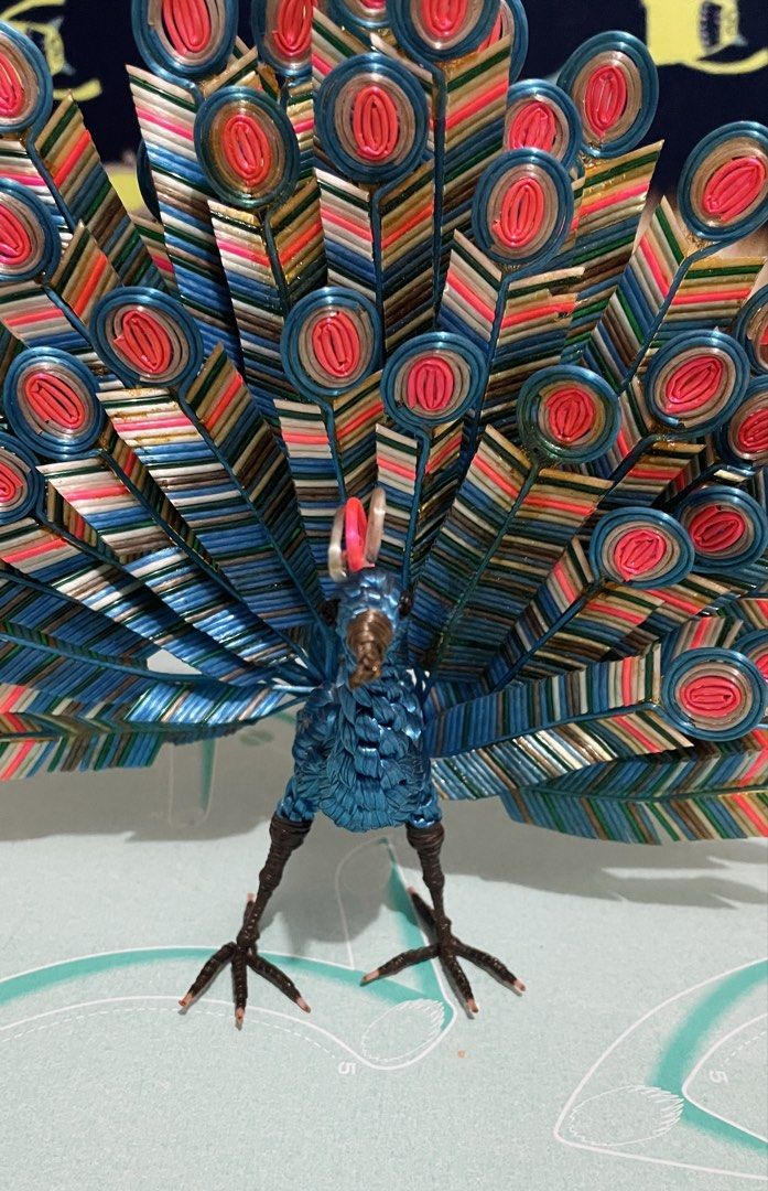 handcrafted 3D decorative peacock figure (Category: Other Home Decor) located in Quezon City. Submitted by sissymissy1527 (Listing ID 1459696876, Image 3). Description: ➡️Made from recycled or repurposed materials like zip ties and wire. ➡️Bendable wires ➡️With freebie flamingo decor.