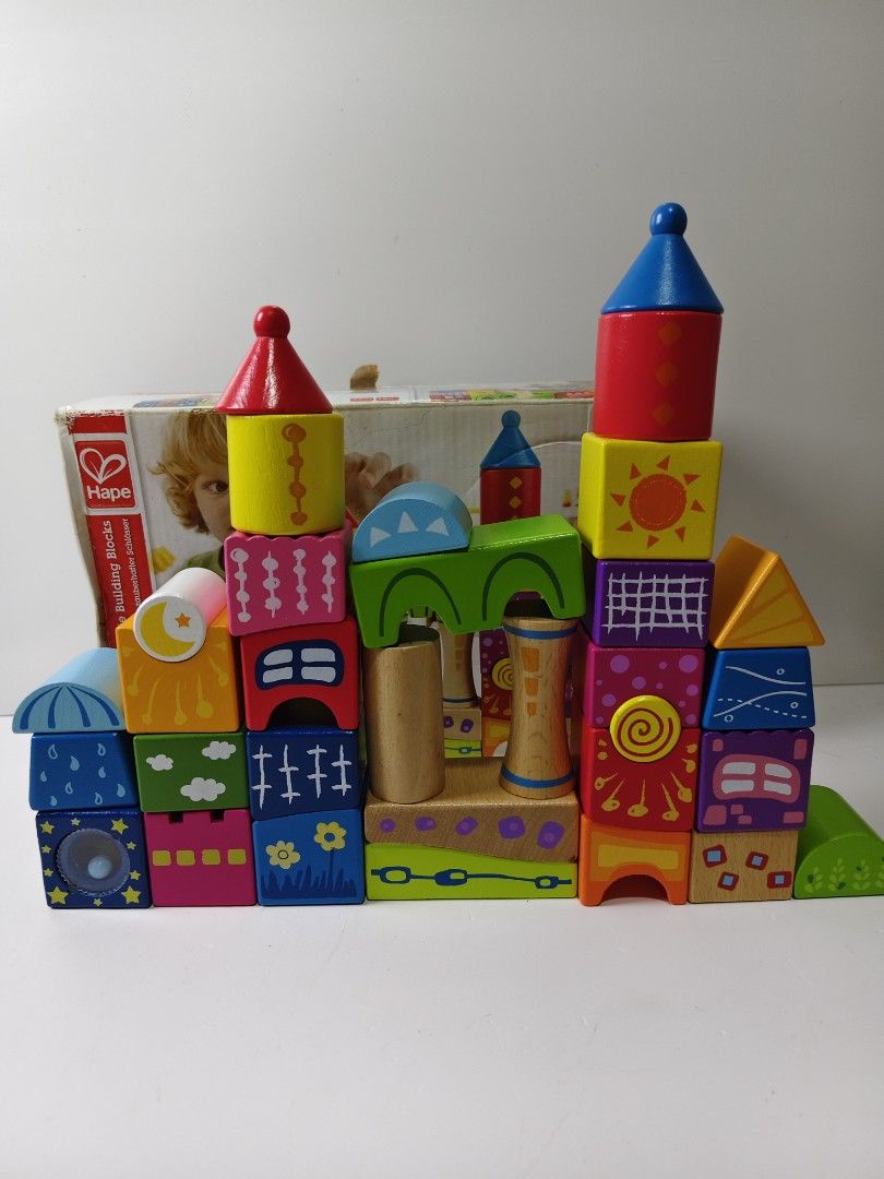 Hape Magical Castle Building Blocks 32 Pieces (Category: Educational & Learning Toys) located in Las Pinas. Submitted by mommy_14 (Listing ID 1459775061, Image 2). Description: - Build a magical castle with 32 colorful Hape building blocks. - Features various patterns and shapes for creative play. - Perfect for little ones aged 18 months and up. - Encourages learning and development through play. - Includes the original box. - with 1 replaced pie