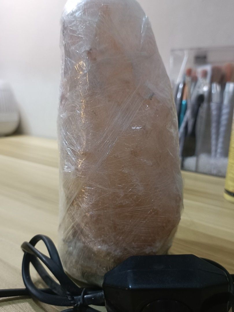 Himalayan Salt Lamp with Power Cord (Category: Lighting) located in Manila. Submitted by alicakes_ (Listing ID 1459883256, Image 1). Description: - Authentic Himalayan Salt Lamp - Comes with power cord and in-line switch - Unique, natural irregular shape - Provides warm, ambient lighting - Perfect for creating a cozy atmosphere - Ready to bring a touch of tranquility to your space.