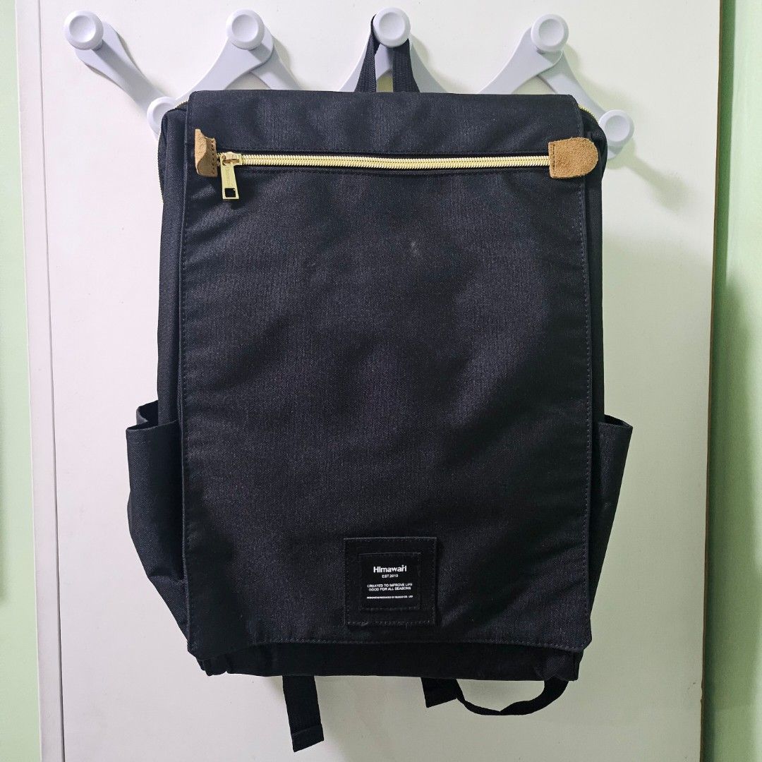 Himawari - Black Backpack with Gold Zippers (Category: Backpacks) located in Quezon City. Submitted by al1en_rob0t (Listing ID 1459788481, Image 1). Description: PRICE: ₱1,500 EACH How to Order: Please message me with the item number you want to purchase or a screenshot of the item. Details: • used once • MOD: LBC, J&T, SDD (shipping fee shouldered by buyer) • MOP: GCash / MariBank.