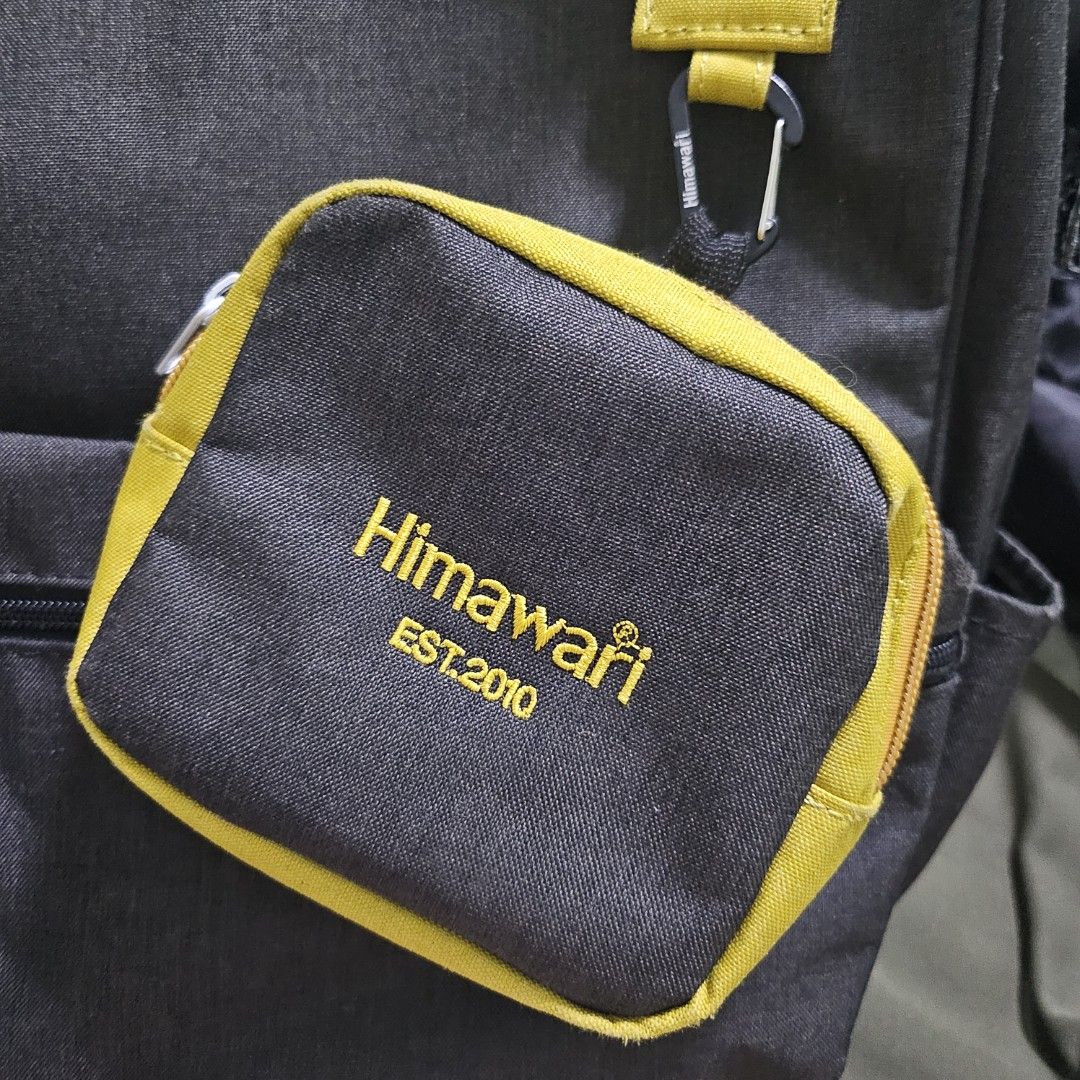 Himawari - Gray with Yellow Accent Backpack with Pouch (Category: Backpacks) located in Quezon City. Submitted by al1en_rob0t (Listing ID 1459788502, Image 2). Description: PRICE: ₱1,250 EACH How to Order: Please message me with the item number you want to purchase or a screenshot of the item. Details: • MOD: LBC, J&T, SDD (shipping fee shouldered by buyer) • MOP: GCash / MariBank.