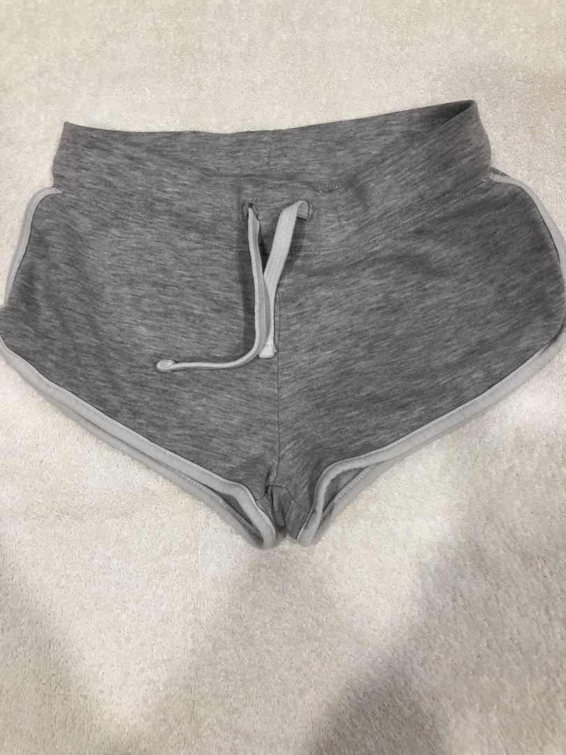 H&M Divided Grey Dolphin Shorts XS (Category: Shorts) located in Manila. Submitted by janmichael26601 (Listing ID 1459800550, Image 1). Description: - H&M Divided Grey Dolphin Shorts - Size: XS - Features: Elastic waistband with drawstring, trimmed edges, back pocket - Ideal for: Lounging and light workouts.