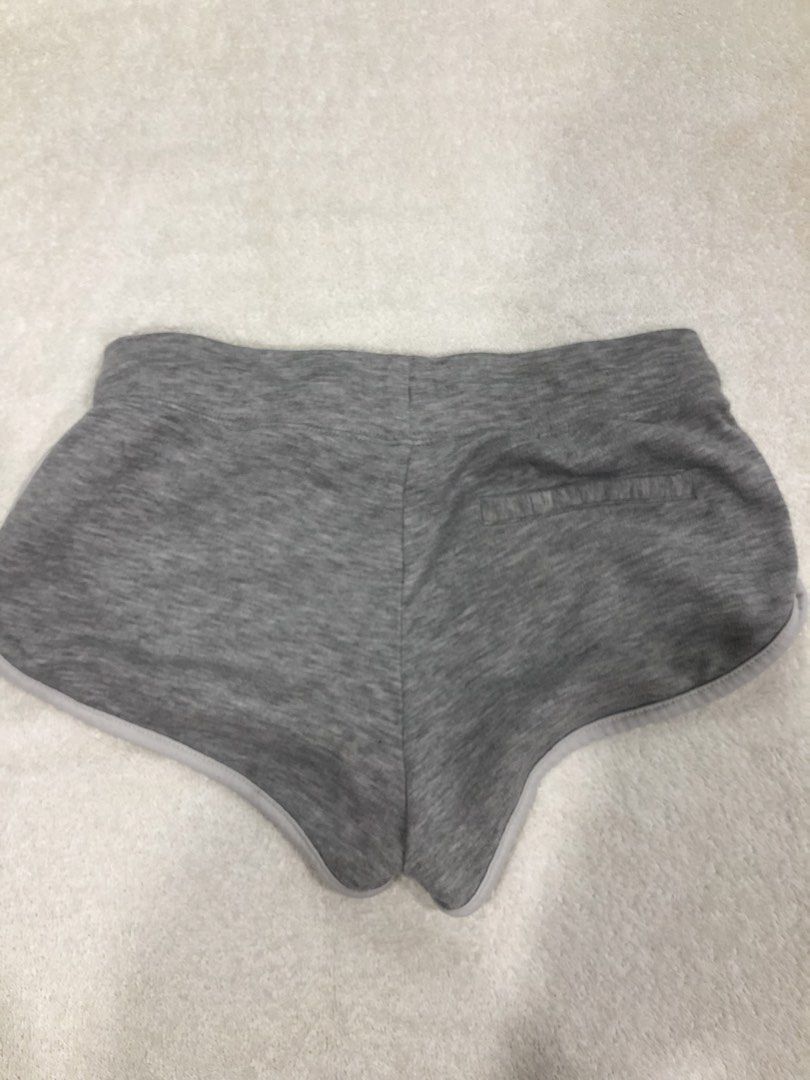 H&M Divided Grey Dolphin Shorts XS (Category: Shorts) located in Manila. Submitted by janmichael26601 (Listing ID 1459800550, Image 2). Description: - H&M Divided Grey Dolphin Shorts - Size: XS - Features: Elastic waistband with drawstring, trimmed edges, back pocket - Ideal for: Lounging and light workouts.
