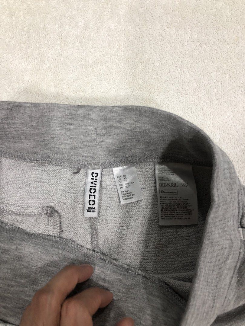 H&M Divided Grey Dolphin Shorts XS (Category: Shorts) located in Manila. Submitted by janmichael26601 (Listing ID 1459800550, Image 3). Description: - H&M Divided Grey Dolphin Shorts - Size: XS - Features: Elastic waistband with drawstring, trimmed edges, back pocket - Ideal for: Lounging and light workouts.
