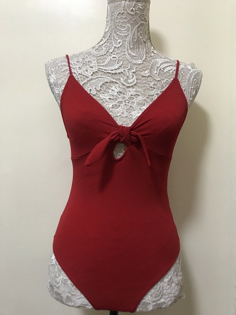 H&M Divided Red Knot Front Cutout Bodysuit (Category: Others Tops) located in Manila. Submitted by airamef28.closet (Listing ID 1459857966, Image 1). Description: - Red H&M Divided bodysuit - Knot front detail with a cutout - Thin spaghetti straps - Stretchy and comfortable material - Versatile: perfect for layering, nights out, or beach days.