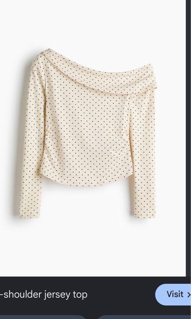 H&M Polka Dot One-Shoulder Jersey Top (Category: Sleeveless) located in Caloocan City. Submitted by zandrarubio (Listing ID 1459727281, Image 3). Description: - Cream colored top with black polka dots - Draped neckline - One-shoulder design - Long sleeves - Soft and stretchy jersey-like fabric - Versatile for dressing up or down.