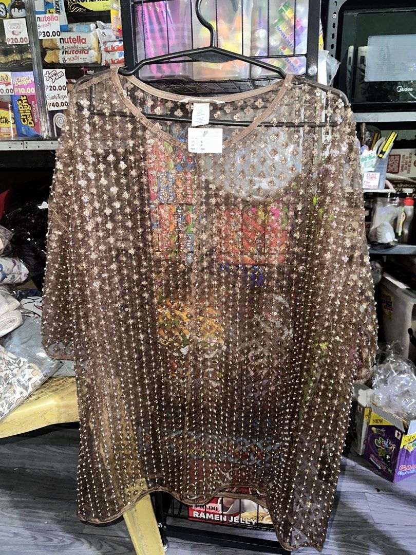 H&M Sequined Mesh Top (Category: Blouses) located in Manila. Submitted by edgiedge (Listing ID 1459863417, Image 2). Description: - Brand: H&M - Type: Sheer mesh top - Color: Brown - Embellishment: All-over sparkly sequins - Styling: Great layered over a camisole or bralette - Occasion: Perfect for parties or a night out - Size: S - Condition: Brand new, never worn ₱200 📍Tondo, Manila.