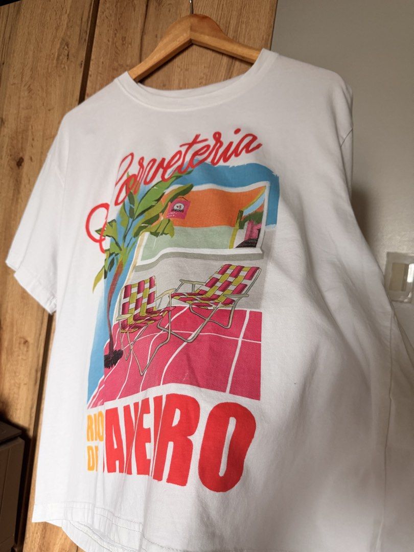H&M Shirt (Category: Shirts) located in Mandaluyong City. Submitted by kat.declutters (Listing ID 1459723662, Image 2). Description: H&M Sorveteria shirt Large 25.5” L x 23.5” W Good condition Bright colors, no stains but with mild stretching on collar Rfs: decluttering.