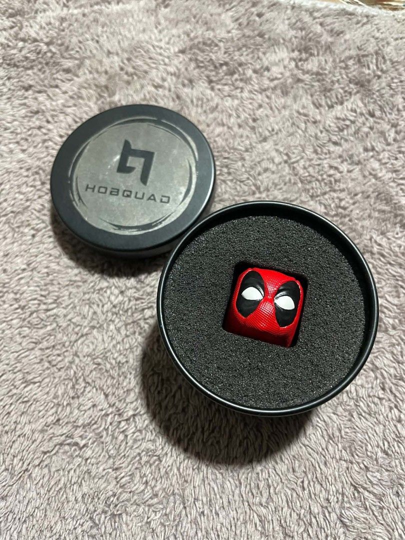 Hobqad Deadpool Artisan Keycap (Category: Computer Keyboard) located in Pasay City. Submitted by nagumeow (Listing ID 1459862761, Image 1). Description: - Unique Deadpool artisan keycap - Compatible with mechanical keyboards - Includes original tin packaging - Ideal gift for Deadpool fans and keyboard enthusiasts.