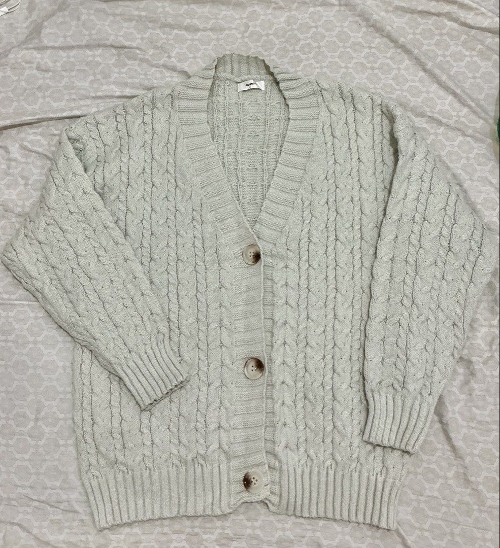 HQ Cream Cable Knit Button Up Cardigan (Category: Coats, Jackets and Outerwear) located in Quezon City. Submitted by lovedbyansb (Listing ID 1459786718, Image 1). Description: - Cream colored cable knit cardigan - V-neck with button closure - Long sleeves with ribbed cuffs and hem - Super cozy and warm - Great for layering over tops or dresses - Easy to style for casual or dressed-up looks - Fits M to L.