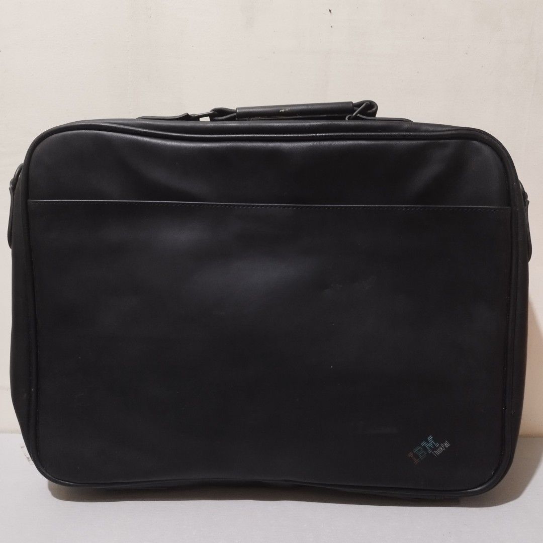 IBM ThinkPad Black Leather Laptop Bag (Category: Laptop Bags & Sleeves) located in Manila. Submitted by love.aiden (Listing ID 1459858931, Image 3). Description: - Classic black IBM ThinkPad laptop bag - Made of durable leather - Multiple interior compartments for accessories and laptop - Sturdy handle for comfortable carrying - Smooth, reliable zippers - Ideal for transporting your tech essentials.