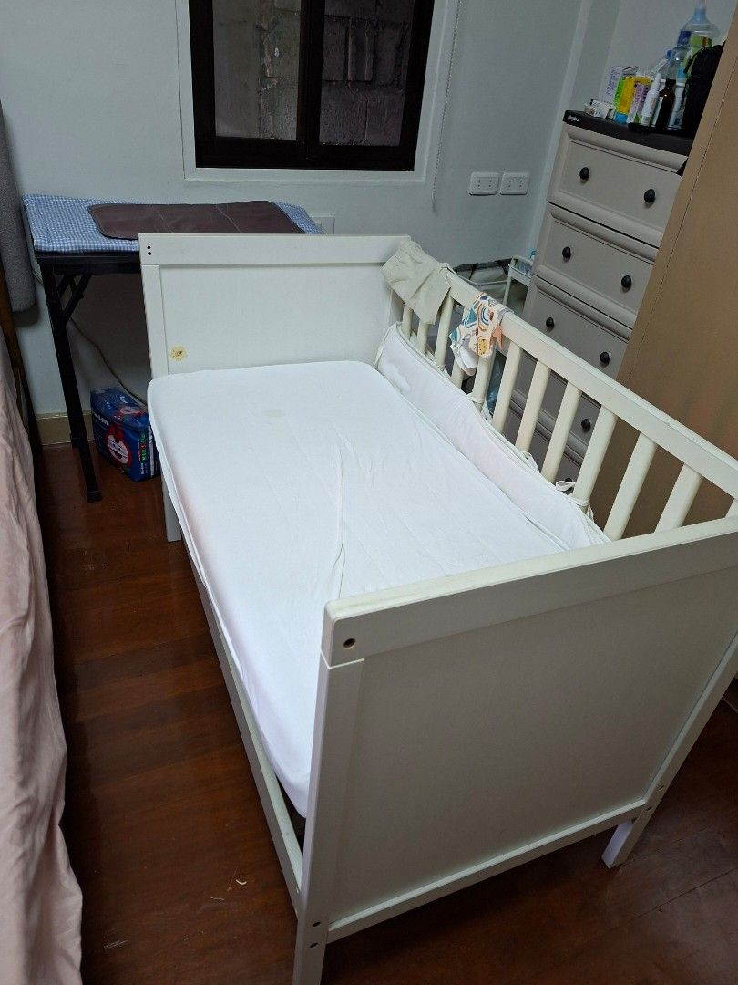 IKEA Sundvik Crib (Category: Cots & Cribs) located in Makati City. Submitted by emil_ph_seller (Listing ID 1459747376, Image 2). Description: The IKEA Sundvik Crib is a classic, convertible solid-wood crib available in two regional sizes depending on your location:Standard US/Canada DimensionsLength: 54 3/8 inches (138 cm)Width: 29 7/8 inches (76 cm)Height: 34 5/8 inches (88 cm)Mattress Size Required: Standard crib mattress (27 1/2" x 52" / 70x13