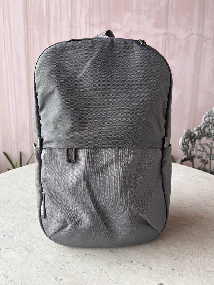 Incase Grey Medium Backpack (Category: Backpacks) located in Las Pinas. Submitted by pastel_rewind_ph (Listing ID 1459713642, Image 1). Description: Incase Grey Backpack (medium to semi-large size) - Nylon Polyester-Canvas External Fabric - 2 open pockets on the sides, 1 zipper front pocket and 1 small zipper top pocket for phone and small valuables. - Zipper Main Compartment, 4 open pockets inside and a padded laptop sleeve compartment fits 14 i