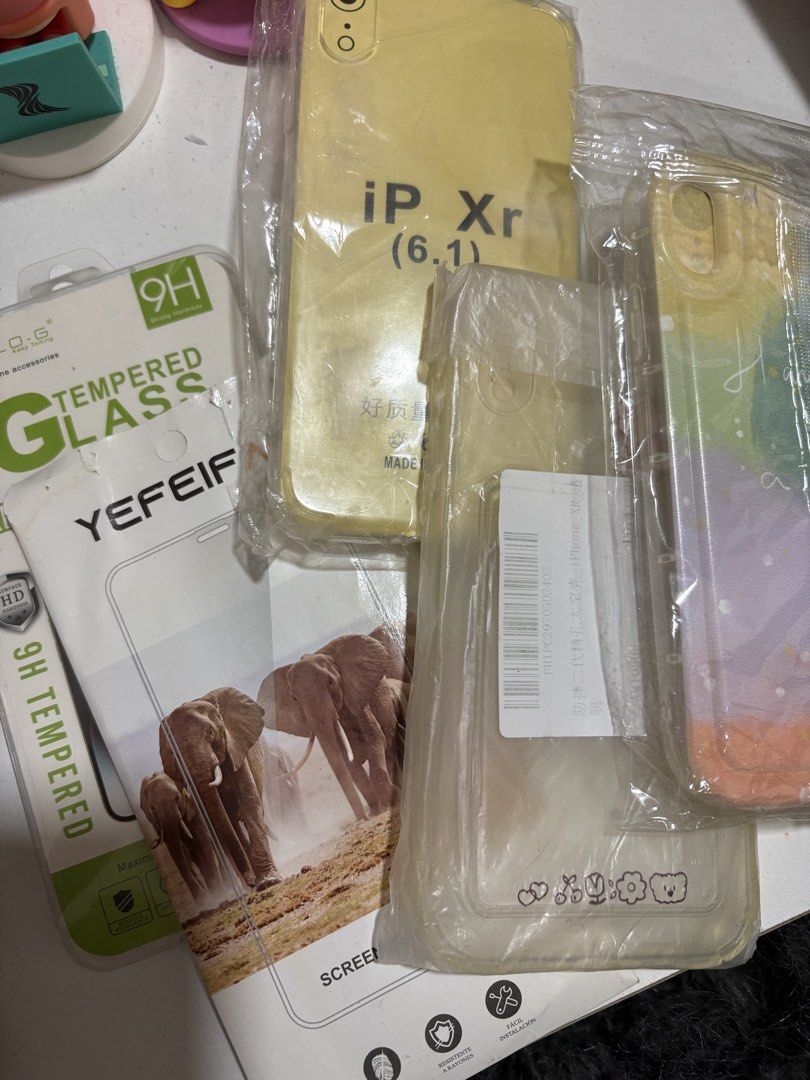 Iphone XR cases and tempered glass (take all) (Category: Cases & Sleeves) located in Quezon City. Submitted by makeitkmn (Listing ID 1459873578, Image 2). Description: All brandnew.